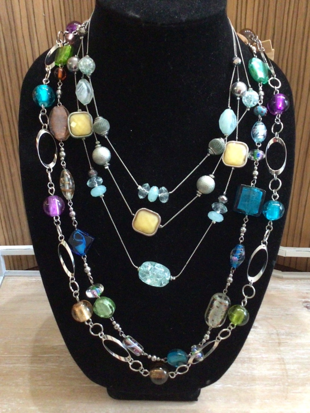 Lot of three necklaces. One is 1946, one is Premier design other unlabeled.